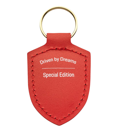 Driven By Dreams 75Y Porsche Crest Keyring - Lava Orange